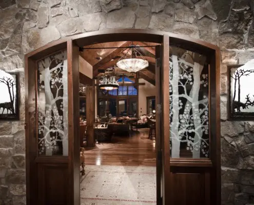 A large open door leading to an indoor dining room.