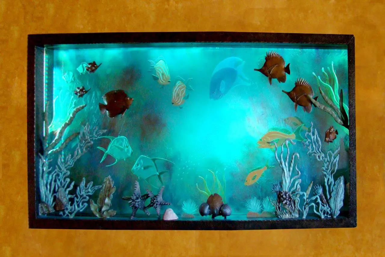 A picture of the bottom of a fish tank.