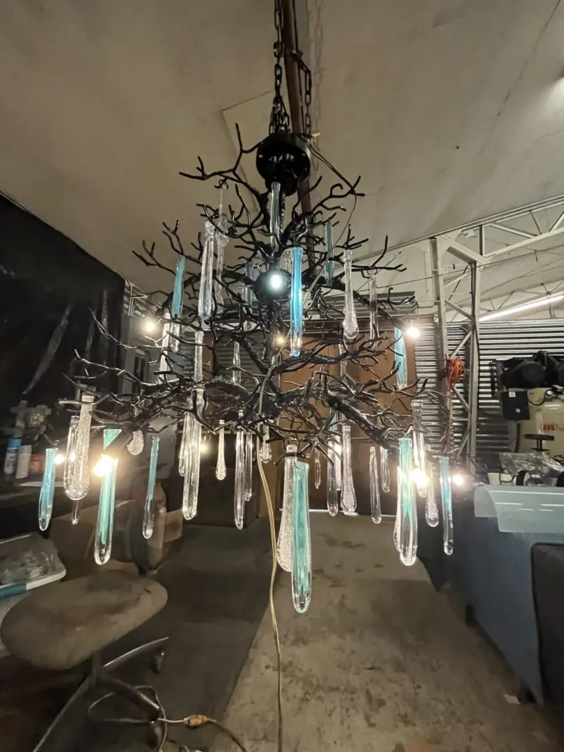 A chandelier with many lights hanging from it.