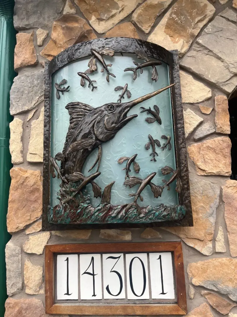 A sign with a picture of a fish on it.